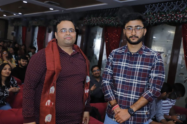 Faculty with Student at Felicitation
